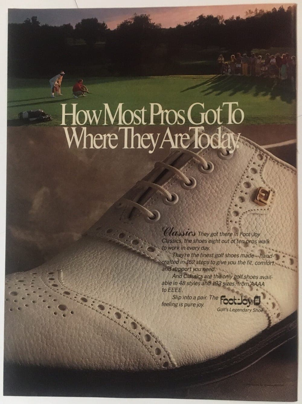 Foot-Joy Classics advertisement from 1989 showing a white brogued golf shoe in close-up above a photograph of players on a green at dusk
